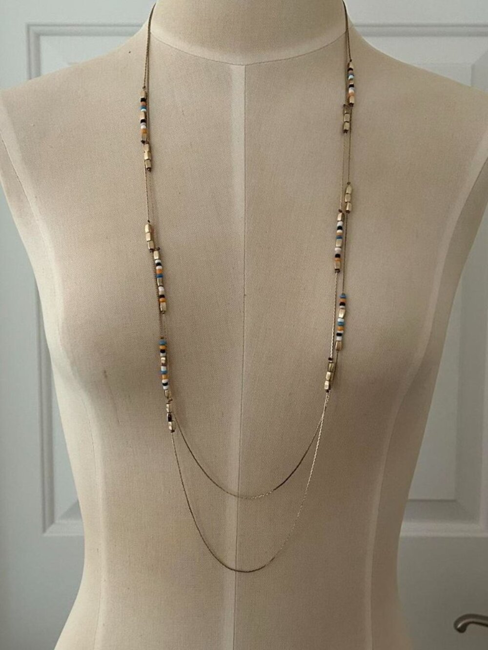 Multi coloured beaded necklace with gold accents